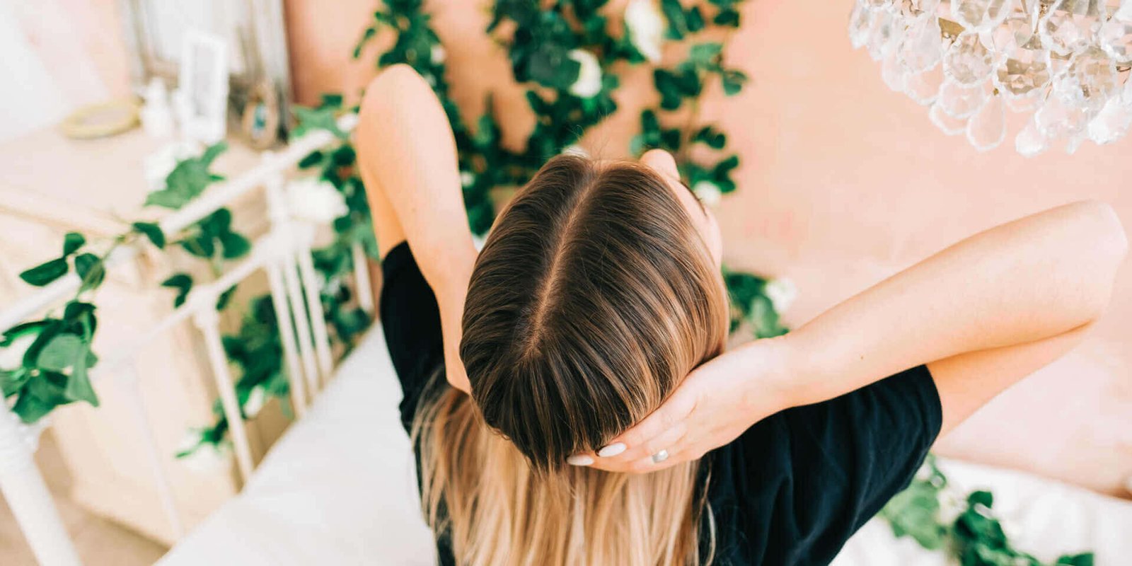Woman with healthy hair showing the results of a balanced scalp microbiome