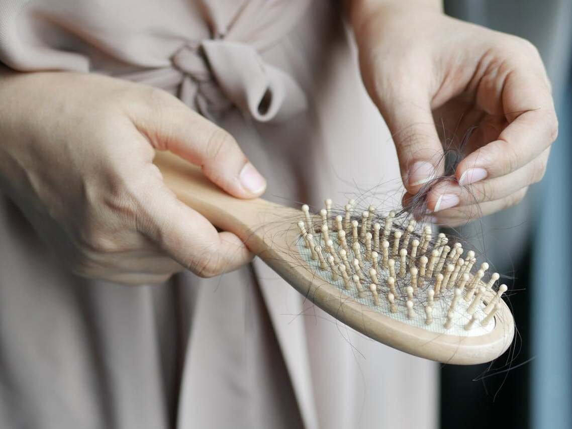 postpartum hair loss new mum hair shedding